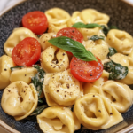 The Easiest Slow Cooker Creamy Tortellini You'll Ever Make